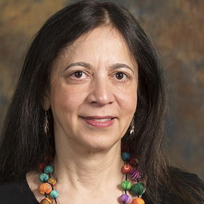 Dr. Comila Shahani-Denning